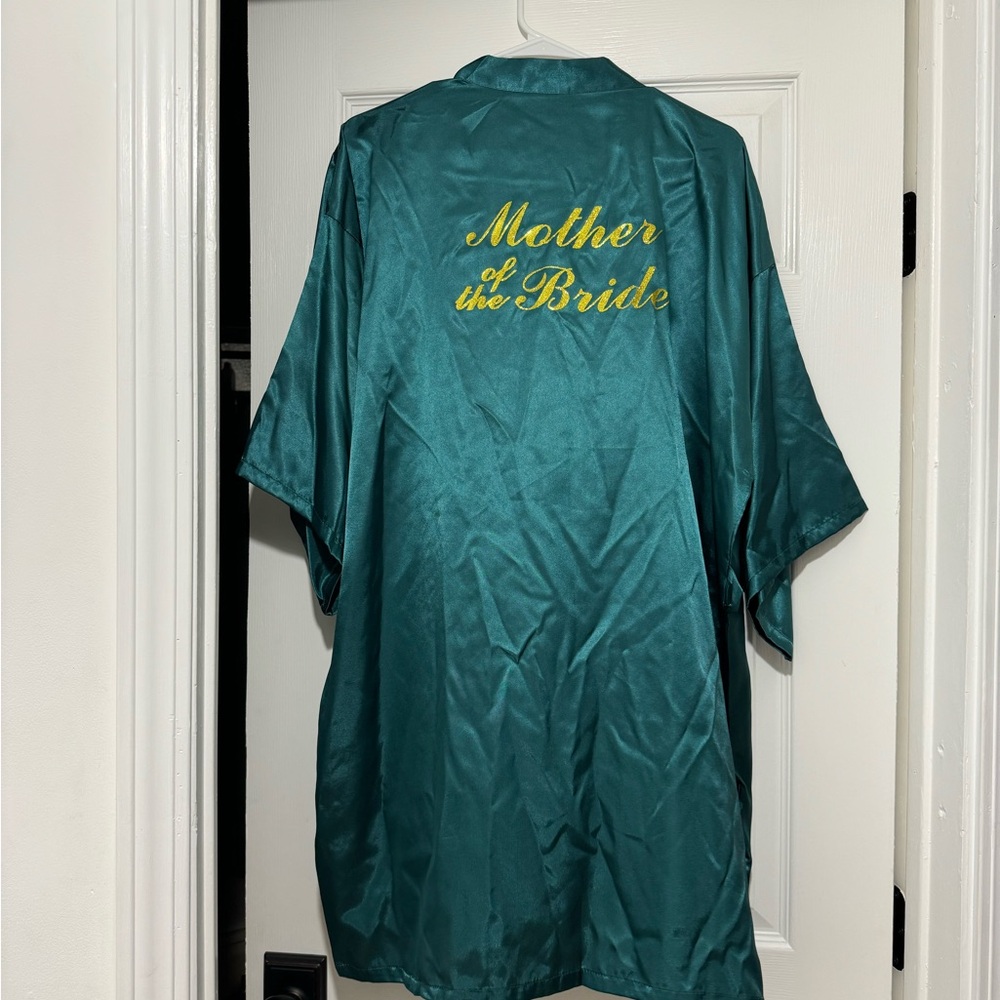 Mother of the bride gown size xl but can fit large as well new whitout tags